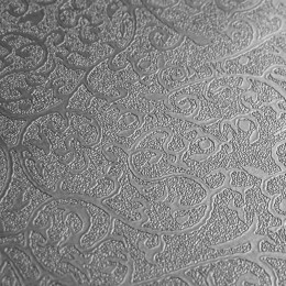 Revêtement mural métallisé à motif arabesque