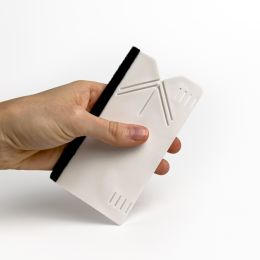 Raclette feutrine pour revêtement adhésif - outil de découpe intégré